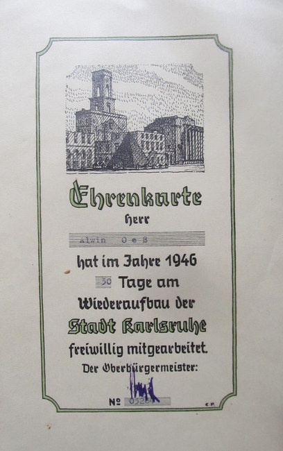 Oeß, Alwin (Anm.: Hagsfeld)  Ehrenkarte. Herr Alwin Oeß hat im Jahre 1946 30 Tage am Wiederaufbau der Stadt Karlsruhe freiwillig mitgearbeitet. Der Oberbürgermeister (Unterschrift) 