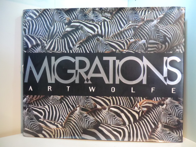 Wolfe, Art:  Migrations. Wildlife in Motion. Text by Barbara Sleeper 