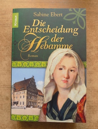 Ebert, Sabine  Die Entscheidung der Hebamme - Roman. 